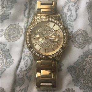 Guess Gold-Tone Multifunction watch.